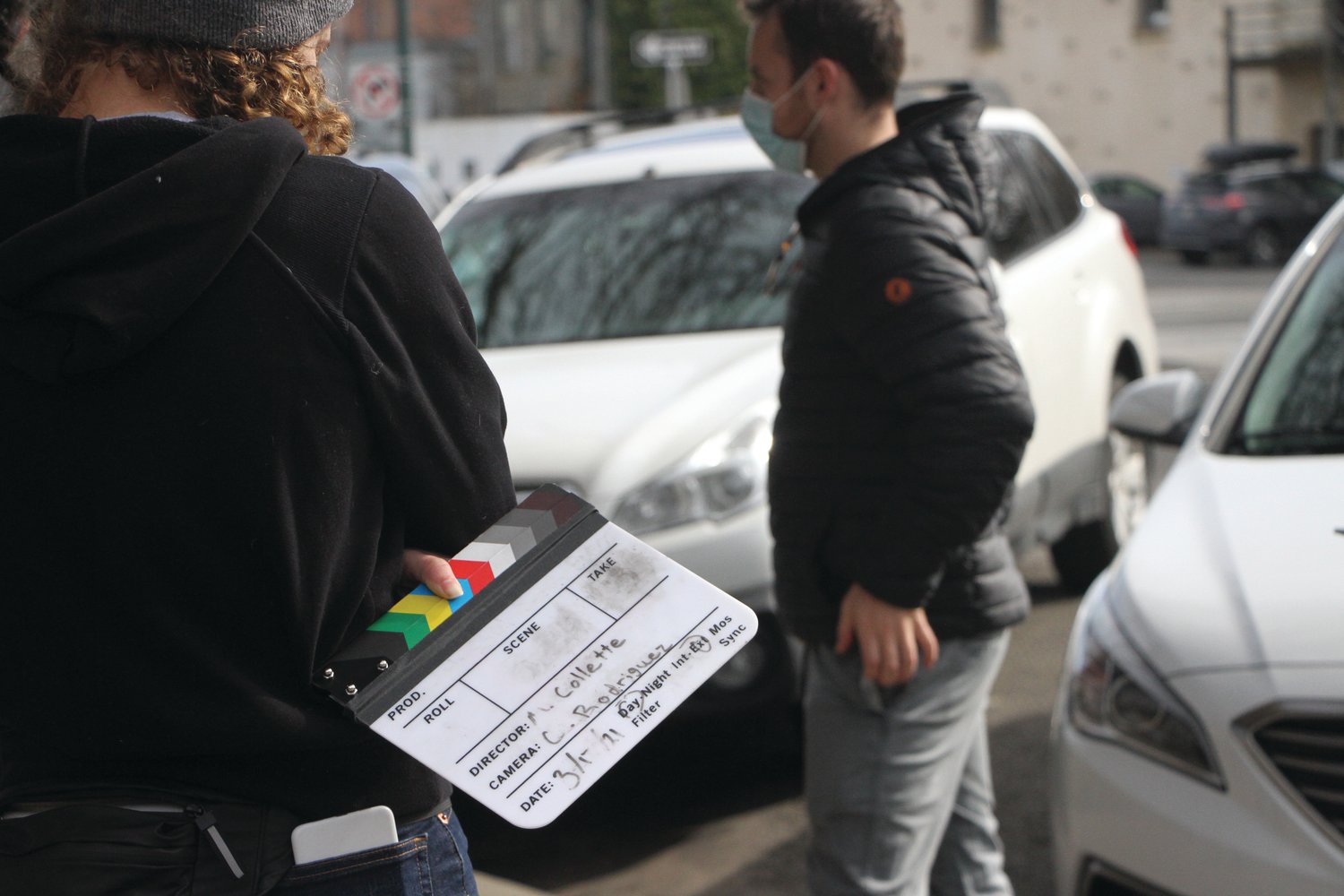 A clapboard sets out the next scene.